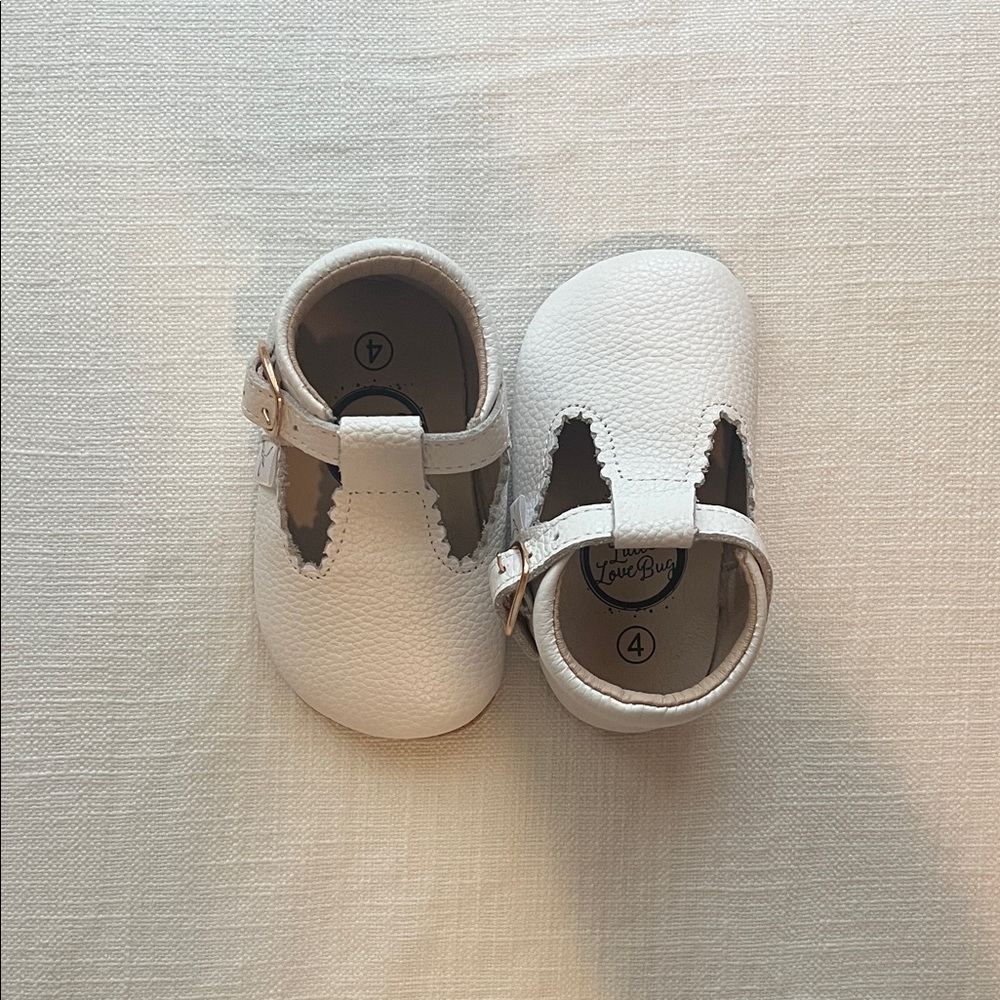 Size 4 Little Love Bug White T Bar Shoes. Never worn.